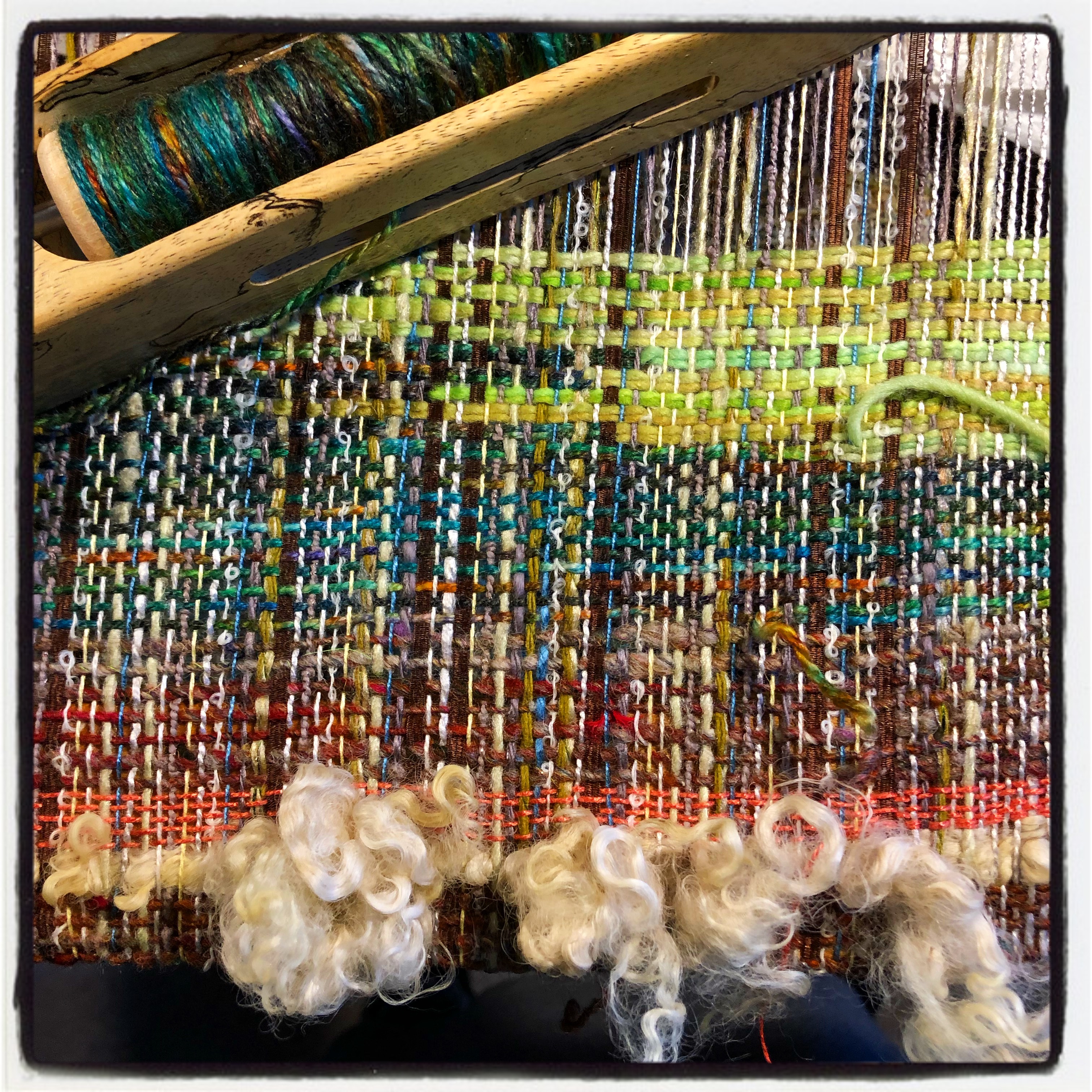 Beyond Potholders: using the potholder loom for weaving with yarn